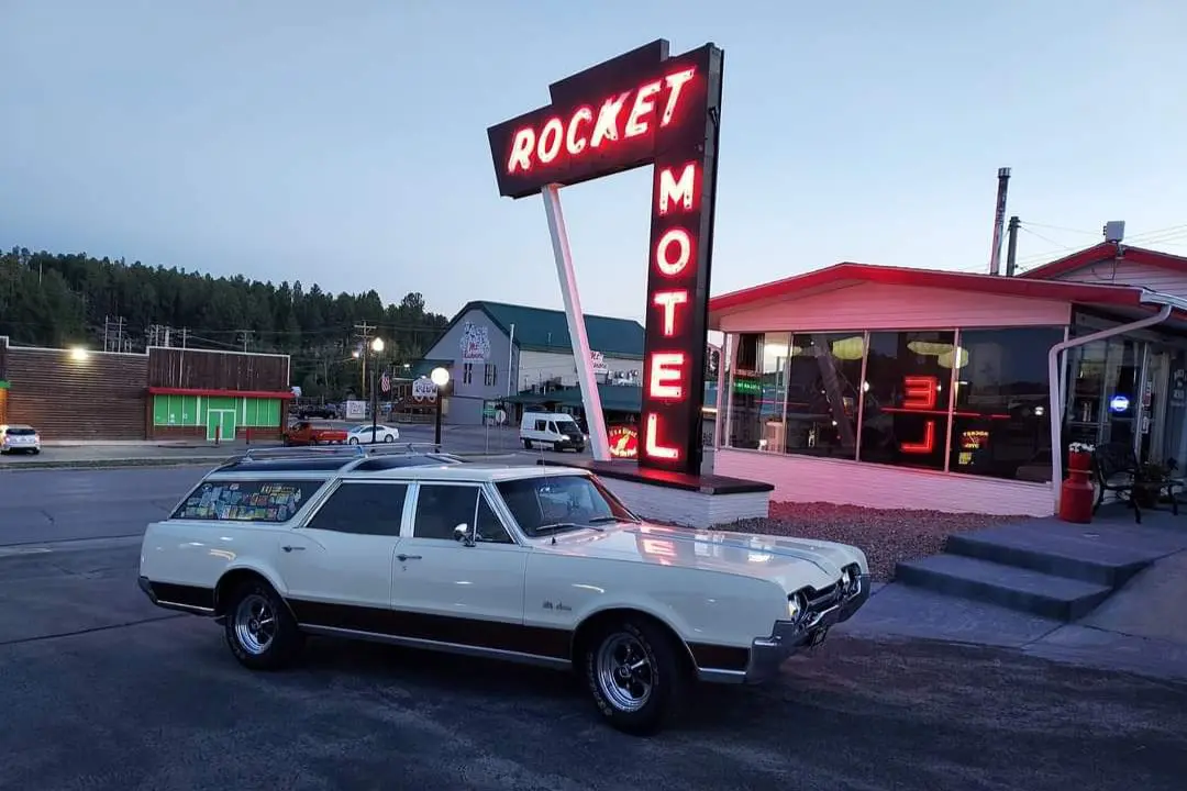 Rocket Motel Neon Sign with Classic Car Model
